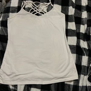 Crossed in the front tank top. Color white. Brand-Maurice’s. Size-M.